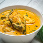 Delicious fried spicy catfish with red curry in thai food.